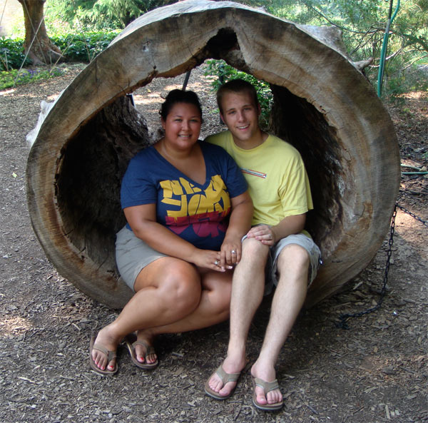 Kristina and Russell sitting in a log